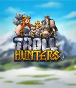 Изображение слота "Troll Hunters" от Play'N Go, где изображены три воина-викинга: две женщины и один мужчина, одетые в традиционные викингские доспехи. На фоне виднеются заснеженные горы, что создаёт атмосферу скандинавской мифологии. Этот слот идеален для любителей скандинавской культуры и поисков приключений.